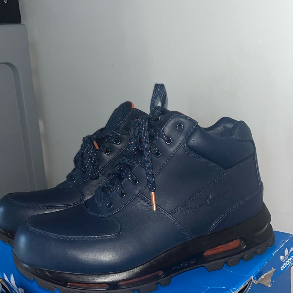 acg’s dark blue Nike boots